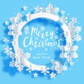 Christmas greeting card with paper snowflakes and stars round frame on blue background for Your holiday design Royalty Free Stock Photo