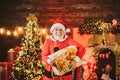 Christmas greeting card with Santa Claus. Santa with gift presents. Santa winter portrait. Winter emotion. Bearded man Royalty Free Stock Photo