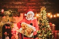 Christmas greeting card with Santa Claus. Santa with gift presents. Santa winter portrait. Winter emotion. Bearded man Royalty Free Stock Photo