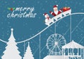 Christmas greeting card with christmas santa claus with snowman and gifts on the roller coaster on amusement park