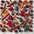 Christmas greeting card from scattered spruce twigs, red dry petals of fruit tree, golden fruits, cinnamon sticks Royalty Free Stock Photo