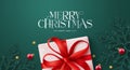 Christmas greeting card vector design. Merry christmas and happy new year text with gift box and green glitter snow flakes Royalty Free Stock Photo