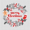 Christmas greeting card with wreath, Christmas socks and gingerbread Man on a knitted seamless background.Winter Christmas frame, Royalty Free Stock Photo