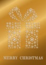 Golden Christmas card with a present made of snowflakes Royalty Free Stock Photo