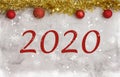 Christmas grey background with red and gold baubles and snow stars. golden tinsel top. 2020 Year Royalty Free Stock Photo