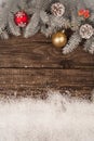 Christmas grunge wooden background with snow fir tree. View with copy space. Vertical Royalty Free Stock Photo