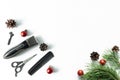 Christmas hairdresser composition with combs, brush, scissors, tools and accessories with new year decorations on white
