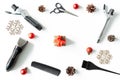 Christmas hairdresser frame with present box, combs, brush, scissors, tools and accessories with new year decorations on