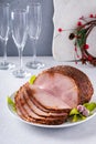 Christmas ham for celebration dinner, spiral sliced ham on a serving plate Royalty Free Stock Photo