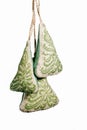 Christmas handmade embroidered decorations soft toys in the form of a Christmas tree isolated on a white background