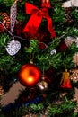 Christmas hanging decorations on fir tree. Decorated Christmas tree. Fir branch with Christmas baubles decorations Royalty Free Stock Photo