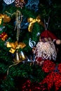 Christmas hanging decorations on fir tree. Decorated Christmas tree. Fir branch with Christmas baubles decorations Royalty Free Stock Photo