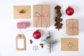 Christmas happy new year composition. Christmas gifts,pine branch, red balls, envelope, white wood snowflakes, ribbon, red berries Royalty Free Stock Photo