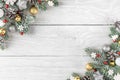 Christmas or Happy New Year composition made of fir tree branches, holiday silver and golden decorations Royalty Free Stock Photo