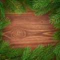 Christmas and Happy New Year dark brown background. Top view, copy space, wooden rustic table, fir branches Royalty Free Stock Photo