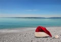 Christmas Hat on the Beach Royalty Free Stock Photo