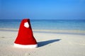 Christmas hat on a beach Royalty Free Stock Photo