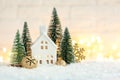 Christmas holiday background with decorative candlestick in the shape of a house Royalty Free Stock Photo