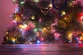 Christmas holiday background with empty wooden deck table over bokeh. Royalty Free Stock Photo