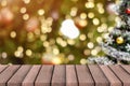 Empty wooden deck table over bokeh light for product montage Royalty Free Stock Photo