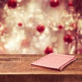 Christmas holiday background with empty wooden table and tablecloth Royalty Free Stock Photo