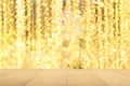 Christmas holiday background with empty wooden table top over festive bokeh light decorate on tree Royalty Free Stock Photo