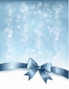 Christmas Holiday background with gift glossy bow Royalty Free Stock Photo