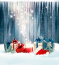 Christmas holiday background with presents and magic box. Royalty Free Stock Photo