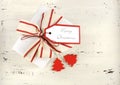 Christmas Holiday background with red and white theme white gift box with natural canvas stripe ribbon