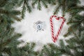 Christmas holiday background with vintage alarm-clock, Candy canes wooden background. Close-up