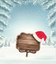 Christmas holiday background with wooden sign and Sana hat.