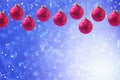 Christmas holiday balls hanging over blue boke background with copy space Royalty Free Stock Photo