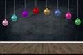 Christmas Holiday Balls ornaments hanging in the class of school on blackboard background. picture copy space for art work design Royalty Free Stock Photo