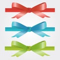 Christmas and holiday bow red, blue and green Royalty Free Stock Photo
