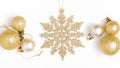 Christmas holiday composition. Festive creative golden pattern, xmas gold decor holiday ball, snowflakes Royalty Free Stock Photo