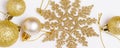 Christmas holiday composition. Festive creative golden pattern, xmas gold decor holiday ball, snowflakes Royalty Free Stock Photo