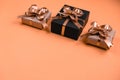 Christmas holiday composition. Various gift boxes on pastel orange background. Christmas, new year, birthday concept.