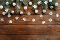 Christmas holiday decoration and fir tree branches on wooden table. Xmas background. Flat lay, top view Royalty Free Stock Photo