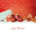 Christmas holiday decorations over red background with white copy space Royalty Free Stock Photo