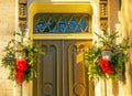 Historic Dutch home door decorated for Christmas