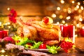 Christmas holiday family dinner. Decorated table with roasted turkey Royalty Free Stock Photo