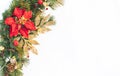 Christmas holiday faux poinsettia pine wreath with white copyspace. Royalty Free Stock Photo