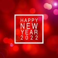 festive glittering defocused red background with bokeh lights -  Happy new year 2022 Royalty Free Stock Photo