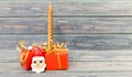 Christmas holiday gifts golden candle an santa`s face Royalty Free Stock Photo