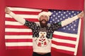 Christmas holiday. Guy celebrate christmas. Cheerful hipster. Love your country. Christmas in United States of America Royalty Free Stock Photo