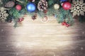Christmas holiday new year wooden top view  background decorated with fir tree and baubles Royalty Free Stock Photo