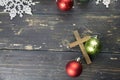 Christmas Holiday Ornaments and Christian Cross on a Dark Wood B Royalty Free Stock Photo