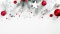 Christmas holiday presents over white background with pine branches, red and silver decorations. Xmas frame top border made of Royalty Free Stock Photo