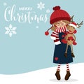 Christmas holiday season background with Cute girl in winter custom with cute reindeer doll and Merry Christmas text. Royalty Free Stock Photo