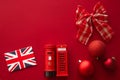 Christmas holiday tradition in United Kingdom and happy holidays flat lay, british flag, London telephone box and xmas